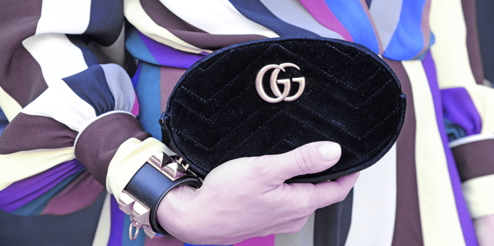 holding gucci marmont belt black velvet bag